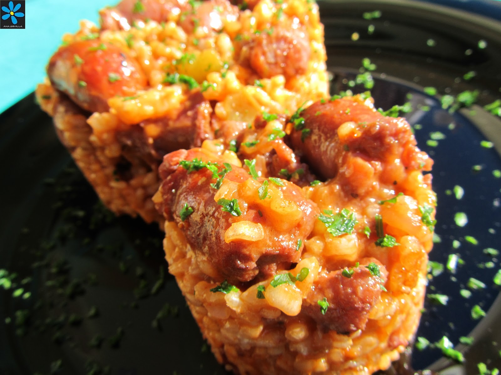 Arroz con salchichas al vino tinto
