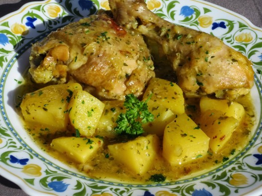 Pollo guisado a la importancia olla GM